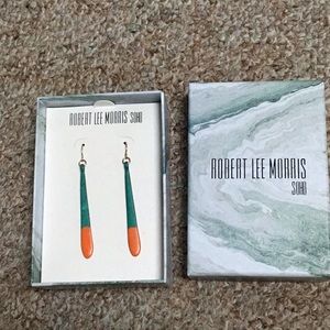 Dangle earrings by Robert Lee Morris